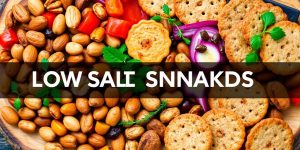 Assorted low salt savory snacks on a wooden platter.